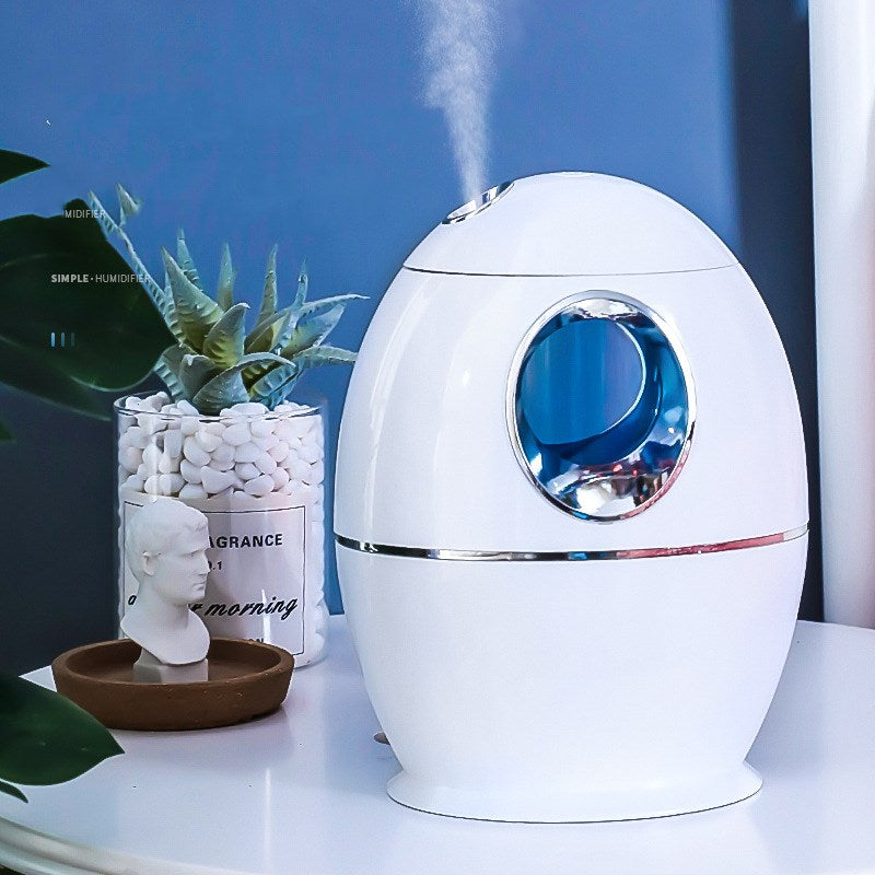 White compact ultrasonic humidifier for a bedroom or home office